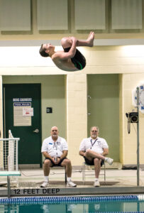 The team’s  only diver, freshman Tim  St. Denis of Stow Adrian Flatgard; frequentflyerphotographer@gmail.com