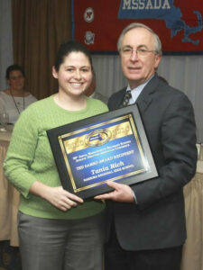 Athletic Director Tania Rich receives the Ted Damko Award                                                             (Courtesy)