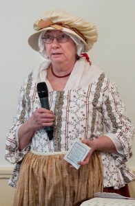 The Stow Minutemen's Linda Stokes uses a more modern tool for explaining the night's agenda.                                                              ( Courtesy Dwight Sipler )