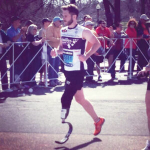 Cameron Kerr running his second complete Boston Marathon this April. This year he ran with the Achille Freedom Team.                                                                                Courtesy