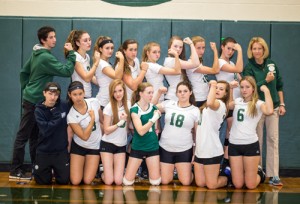 The Nashoba Varsity Girls Volleyball team with team managers Max Sharin and Nathan Kovacs, and  coach Johnna Doyle.                                                                   Adrian Flatgard; www.frequentflyerphotographer@gmail.com