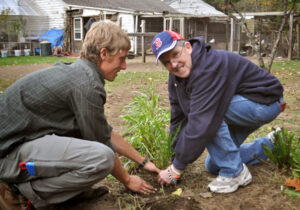 TILL client, John, plants some late greens                                                        Nancy Arsenault