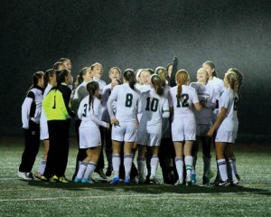 The Girls Varsity soccer team in a rain-soaked victory Thursday night.  Susan Shaye; www.susanshaye.com
