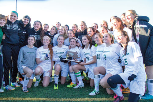 The Nashoba Girls Soccer team lifted the District Championship Trophy on Saturday with a 1-0 victory over Algonquin Regional.                    The team moved on to the state semi-finals on Tuesday, but lost in the last minutes of the game with a final score of 1-0.                                         Adrian Flatgard; frequentflyerphotographer@gmail.com