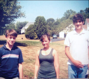Neighbors and friends (l-r) Brendan Aylward, Leah Tepper, and Will Hurley pose in their neighborhood during their school days.                                                               Courtesy