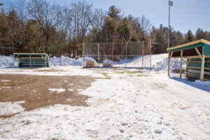 Several weeks ago, co-captain Sarah Gaffney reported that Bill Tuttle, Dan Gaffney, and Jack Gaffney worked for a total of 12 hours over two days to plow off the softball field at Nashoba to give the melting and drying out process a head start.                                                              Susan Shaye; www.susanshaye.com