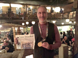 Chris Beck on Sunday Feb. 28  at the restaurant Gonpachi in Tokyo (the restaurant that was the inspiration for the fight scene in the movie Kill Bill).  Chris is wearing his Tokyo Marathon Medal from finishing earlier in the day. Chris said his next and last stop in his marathon series is Boston in April. 