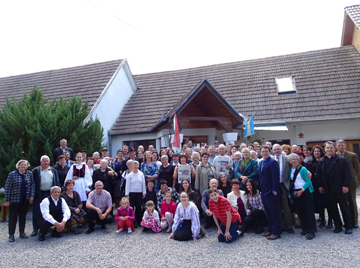 Two different editions of the Stow Independent and 31 members of the First Parish Church Unitarian Universalist of Stow and Acton with members of their sister  Church in Olasztelek, Transylvania, Romania after the Sunday, April 24th, service where Rev. Tom Rosiello preached and the FPC choir sang.  This was followed by a buffet of Transylvanian and Hungarian foods, including amazing homemade desserts, on the lawn under the apple trees next to the Olasztelek Church. A moving and learning experience for all.
